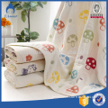 100% cotton organic baby blanket and muslin swaddle blanket